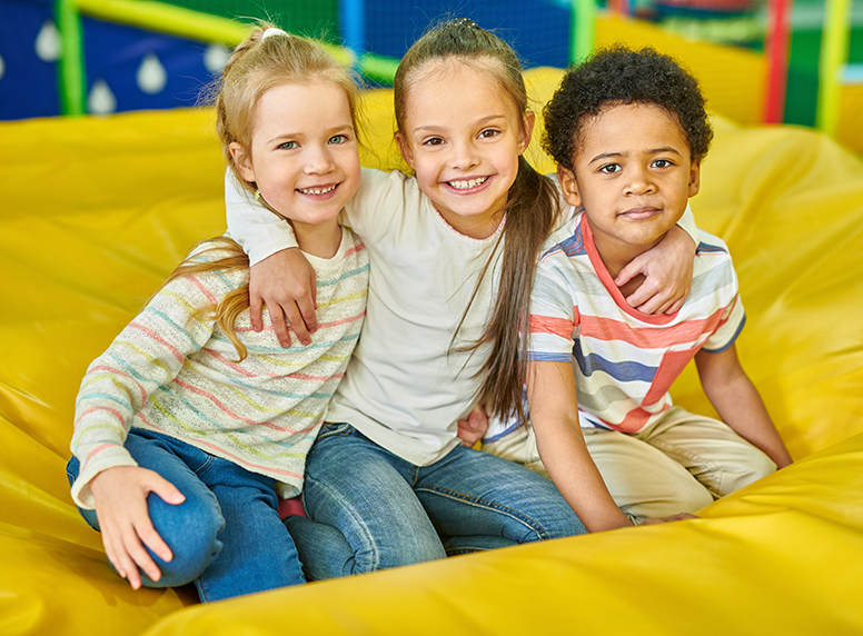 three kids having fun at thunder road